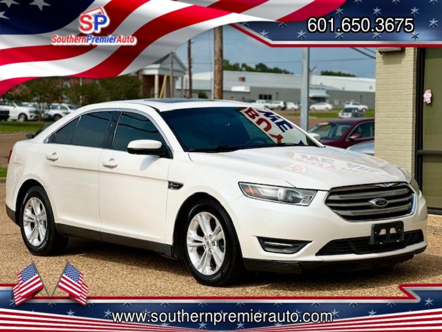 2015 WHITE FORD TAURUS SEL (1FAHP2E86FG) , located at 922 W. Beacon St., Philadelphia, MS, 39350, (601) 650-3675, 32.770447, -89.127151 - Photo#0